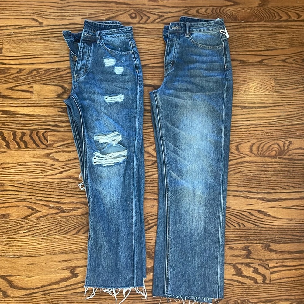2 pair Grace & Lace denim. Distressed is size 0 and non distressed is a 2.